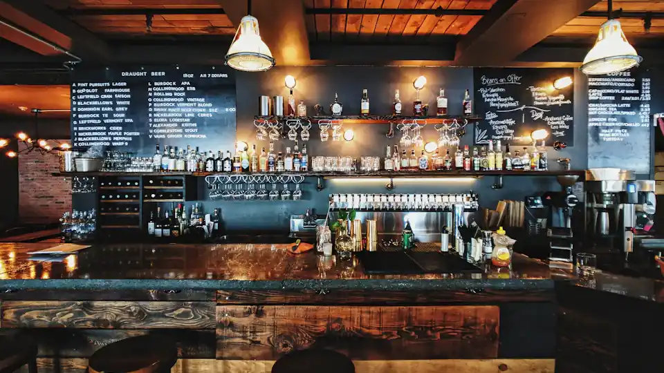 Craft taproom interior with beer taps and warm lighting